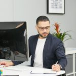 a man sitting at a desk